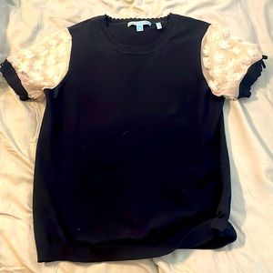 Draper James knit top - Medium - Navy blue with flower appliqué sleeves.